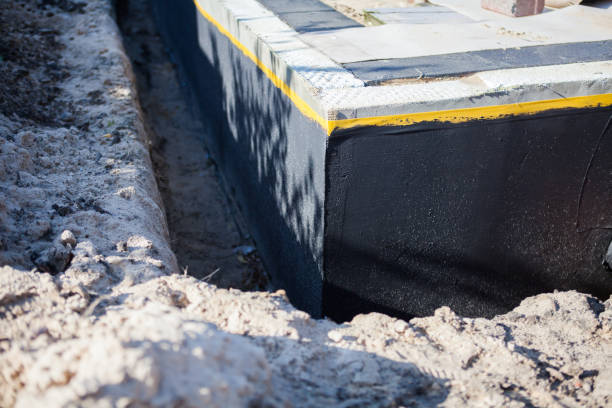 Professional Waterproofing technician working in King George, VA